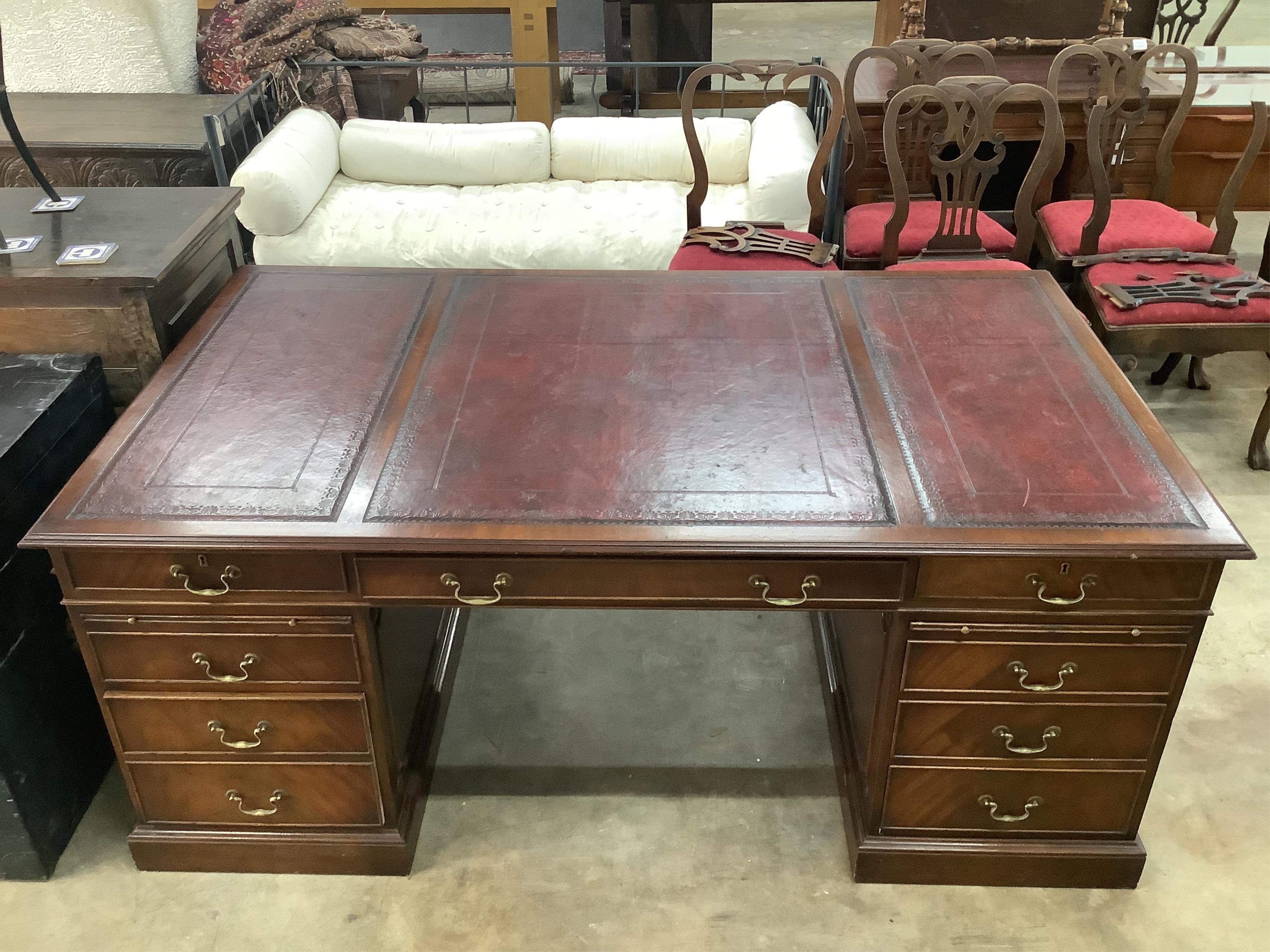 A George III style mahogany pedestal desk, width 186cm, depth 106cm, height 76cm. Condition - good
